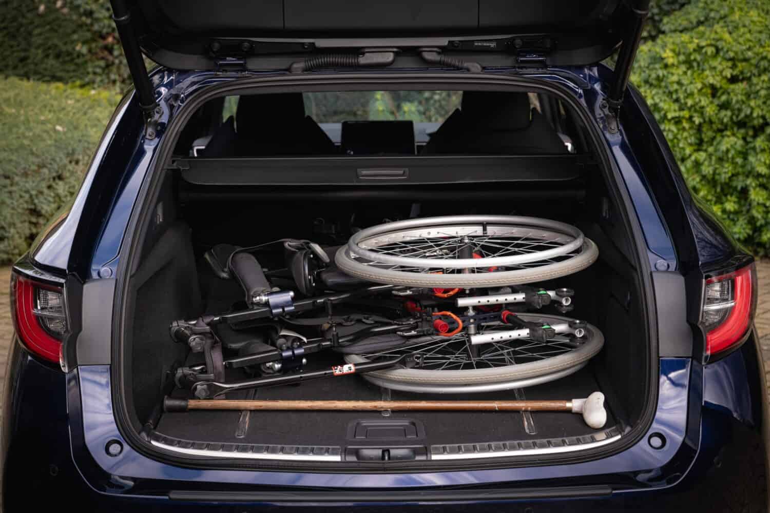 Helping someone with mobility issues get into and out of a car mobility