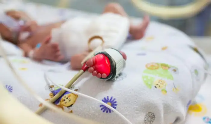 Why do premature babies have low blood pressure?