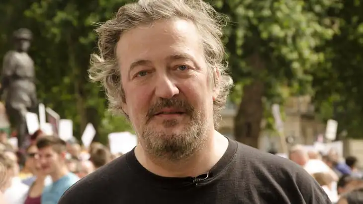 Stephen Fry returns to work after prostate cancer surgery